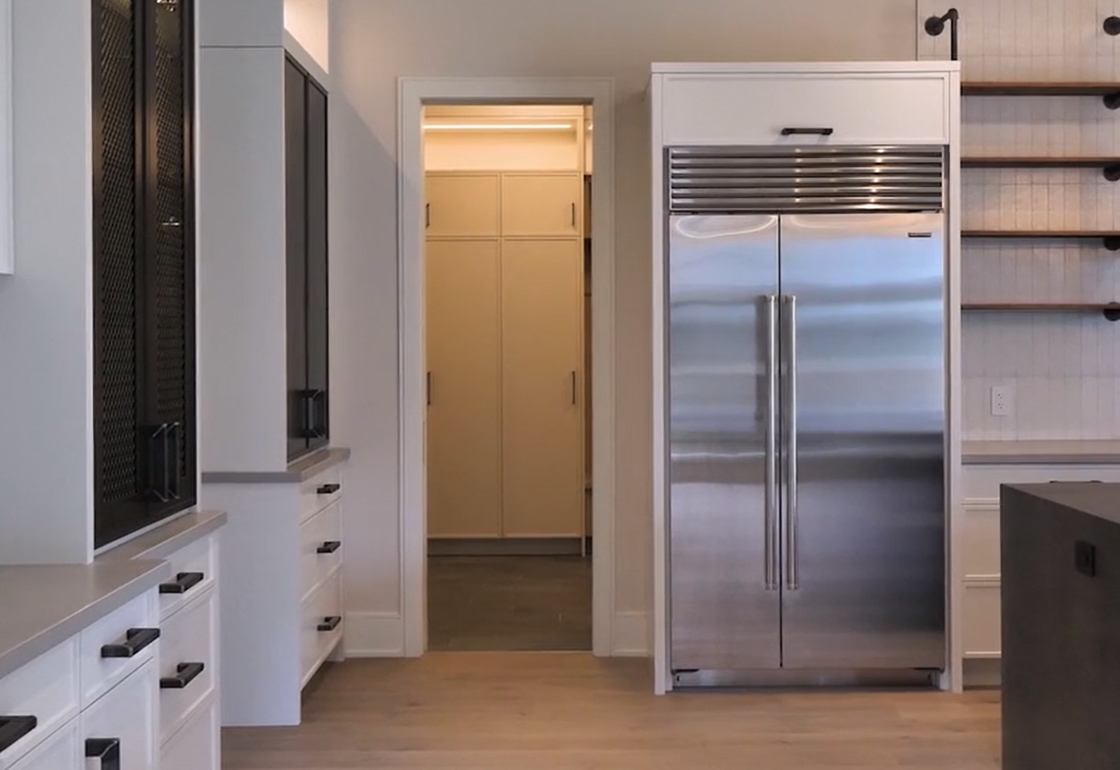 Trafalgar Highlands cozy bedroom with warm tones, natural light, perfect for peaceful living.