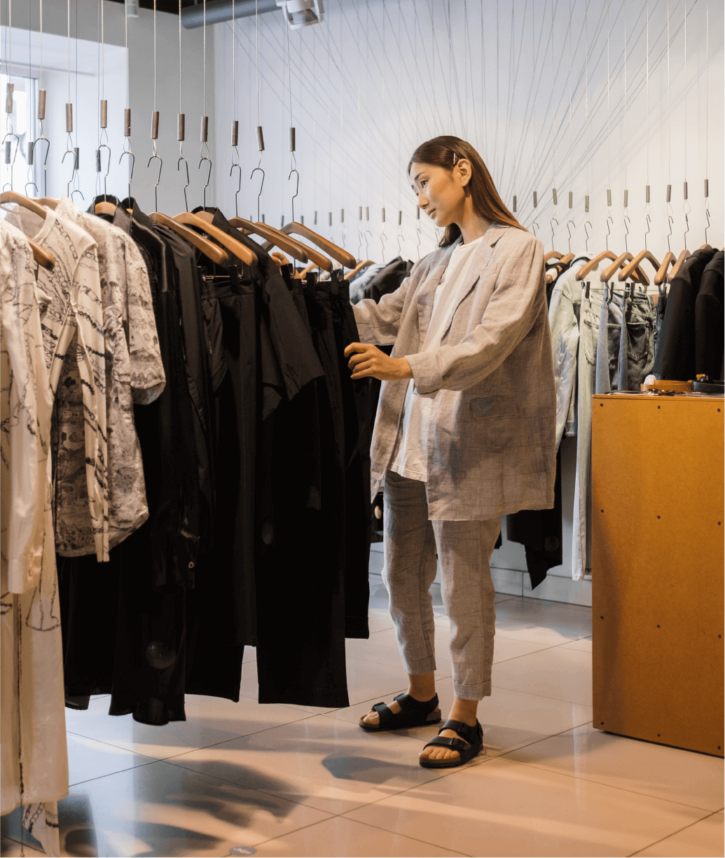 Young girl carrying shopping bags from a local market near Trafalgar Highlands