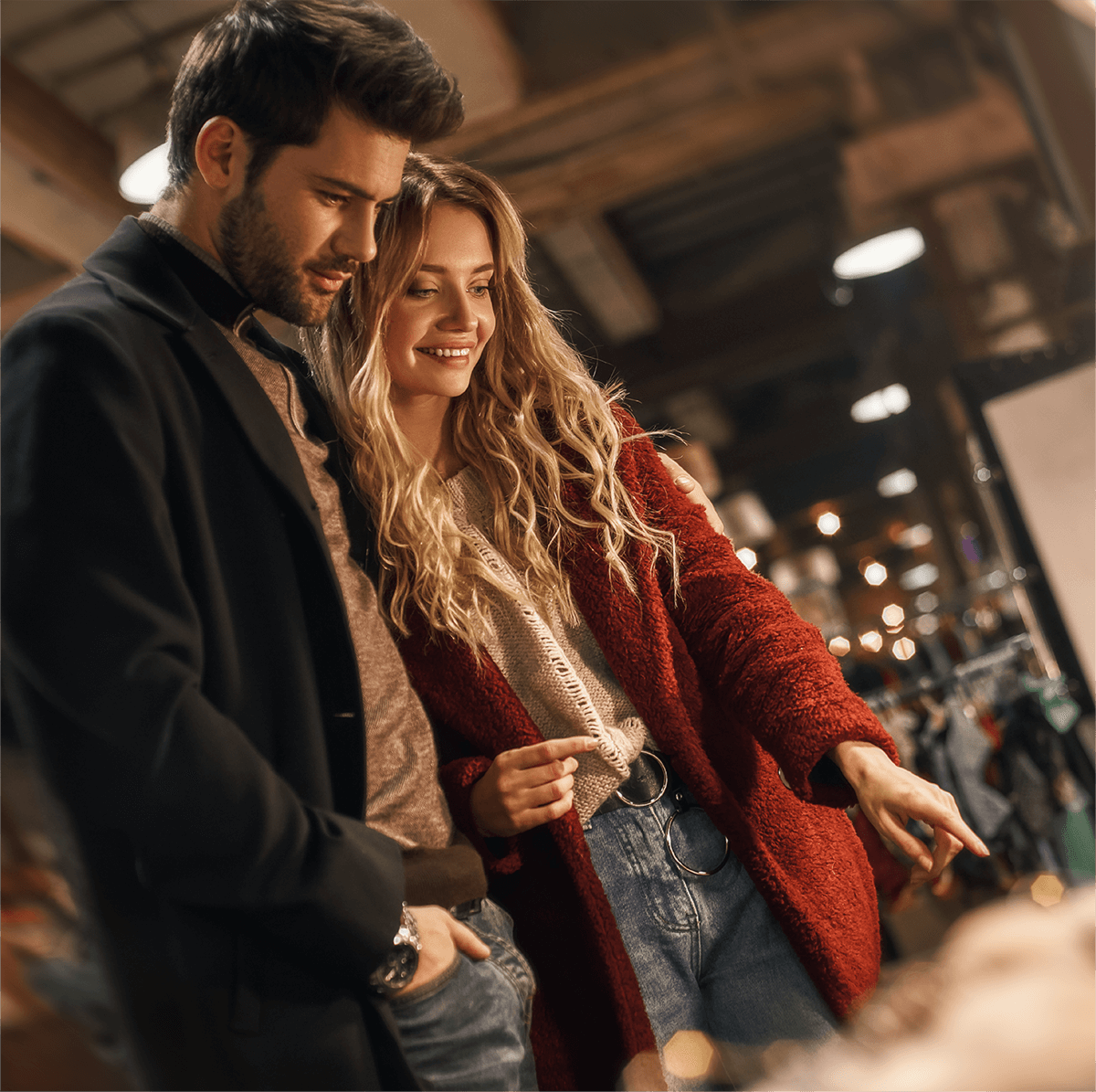 A happy couple strolling hand-in-hand near Trafalgar Highlands, enjoying peaceful community living.